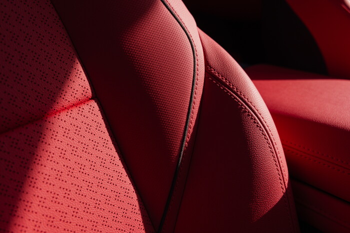 Close up of Adrenaline Red leather perforated seats in 2024 Chevrolet Blazer EV SS. Preproduction mo