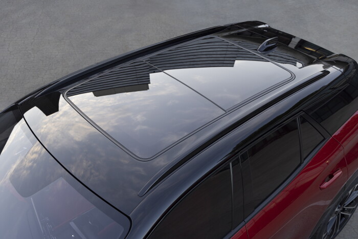 Overhead view of black sunroof on 2024 Chevrolet Blazer EV SS in Radiant Red Tintcoat. Preproduction