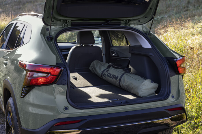 View of cargo space through open liftgate in Chevrolet Trax ACTIV in Cacti Green. Pre-production mod