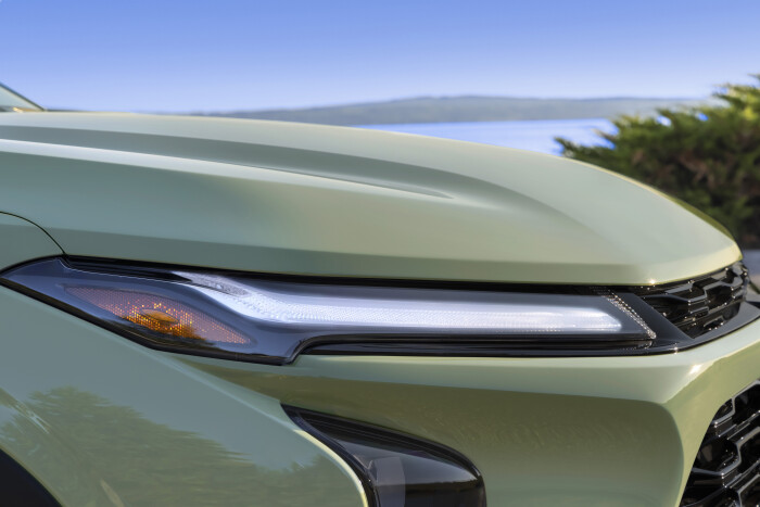 Close-up view of passengers side headlight on Chevrolet Trax ACTIV in Cacti Green. Pre-production mo