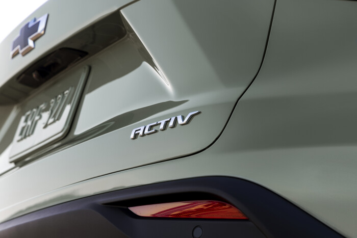 Close-up view of ACTIV badge on Chevrolet Trax ACTIV in Cacti Green. Pre-production model shown. Act