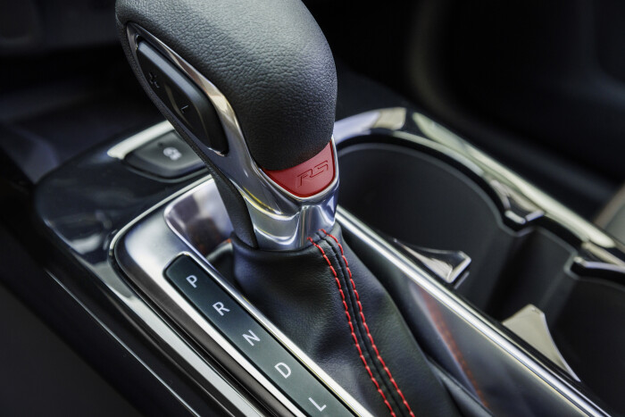 Close-up of gear shifter in Chevrolet Trax RS with Jet Black with Red Accents Interior. Pre-producti