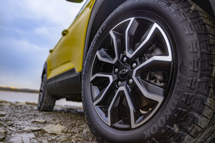 Close up view of passenger side wheel on 2024 Chevrolet Trailblazer ACTIV in Nitro Yellow Metallic. Preproduction model shown. Actual production model may vary. Available in fall 2023.