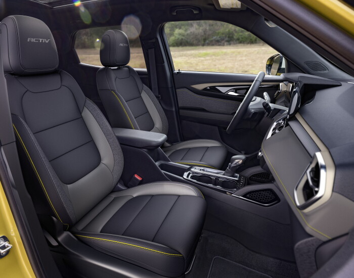 Passenger side view of front cabin in 2024 Chevrolet Trailblazer ACTIV with Jet Black with Artemis interior. Preproduction model shown. Actual production model may vary. Available in fall 2023.