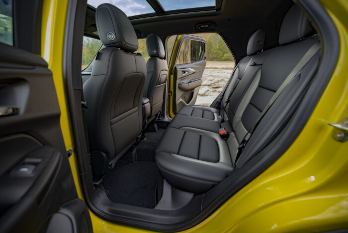 View of rear cabin of 2024 Chevrolet Trailblazer ACTIV in Nitro Yellow Metallic with Jet Black with Artemis interior. Preproduction model shown. Actual production model may vary. Available in fall 2023.