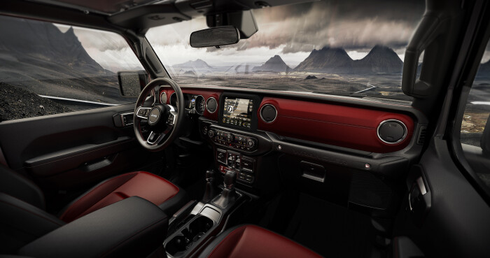 The 2023 Jeep Wrangler Rubicon 20th Anniversary editions feature unique red-and-black leather seats, red leather-wrapped instrument panel bolster and RUBICON 20TH special shifter medallion
