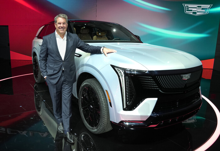 General Motors President Mark Reuss standing with the all-electric 2025 Cadillac ESCALADE IQ at its unveiling New York City. (Photo by Todd Plitt for Cadillac)