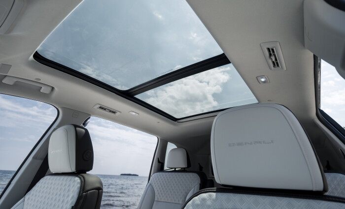 Detail shot of the 2024 GMC Acadia Denalis premium panoramic glass sunroof.