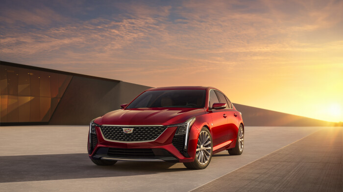 Front 7/8 view of the 2025 Cadillac CT5 Premium Luxury in Radiant Red Tintcoat.