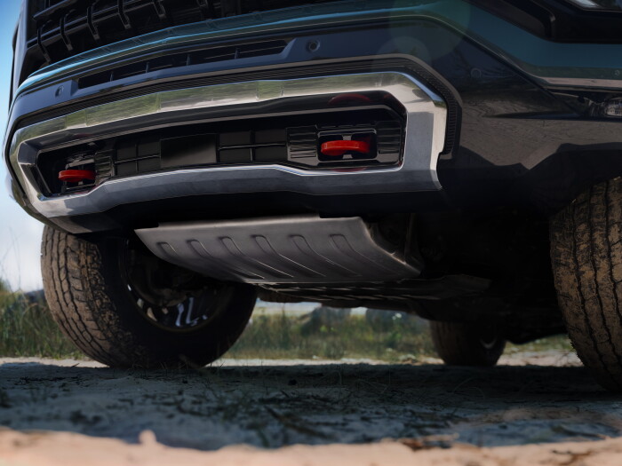 Detailed shot of skid plate and red tow hooks on the 2025 Tahoe Z71